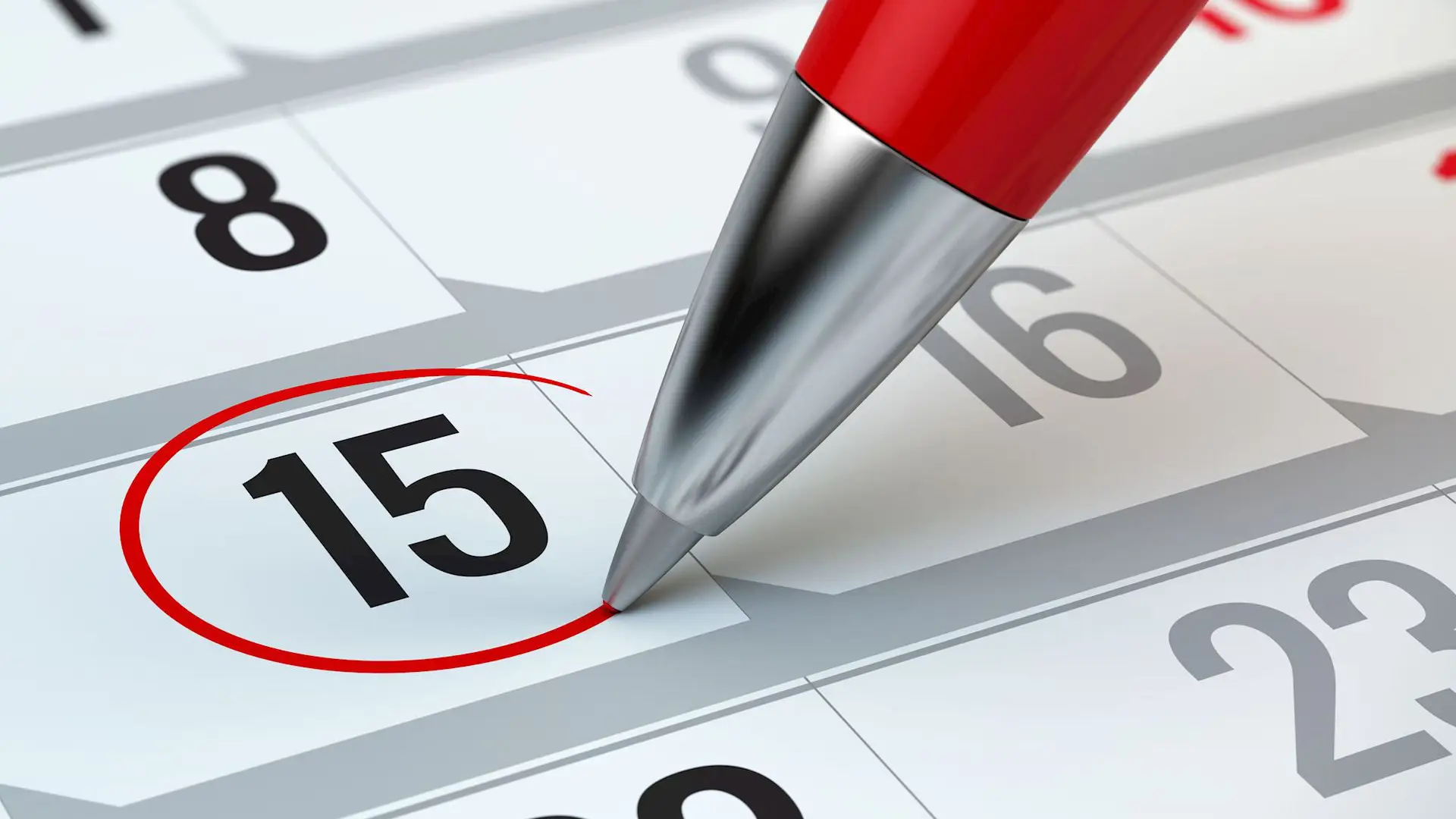 Un calendrier dont le 15 est entouré au stylo rouge