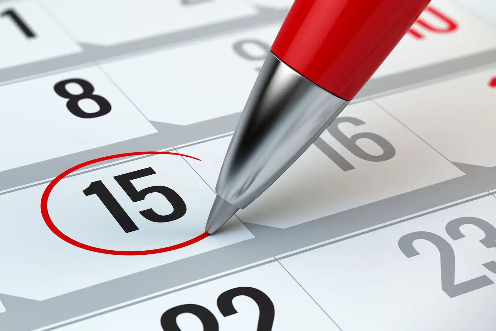 Un calendrier dont le 15 est entouré au stylo rouge